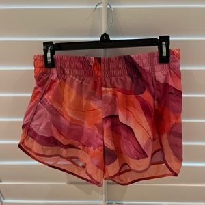 Athleta pink and orange mesh pace runner shorts